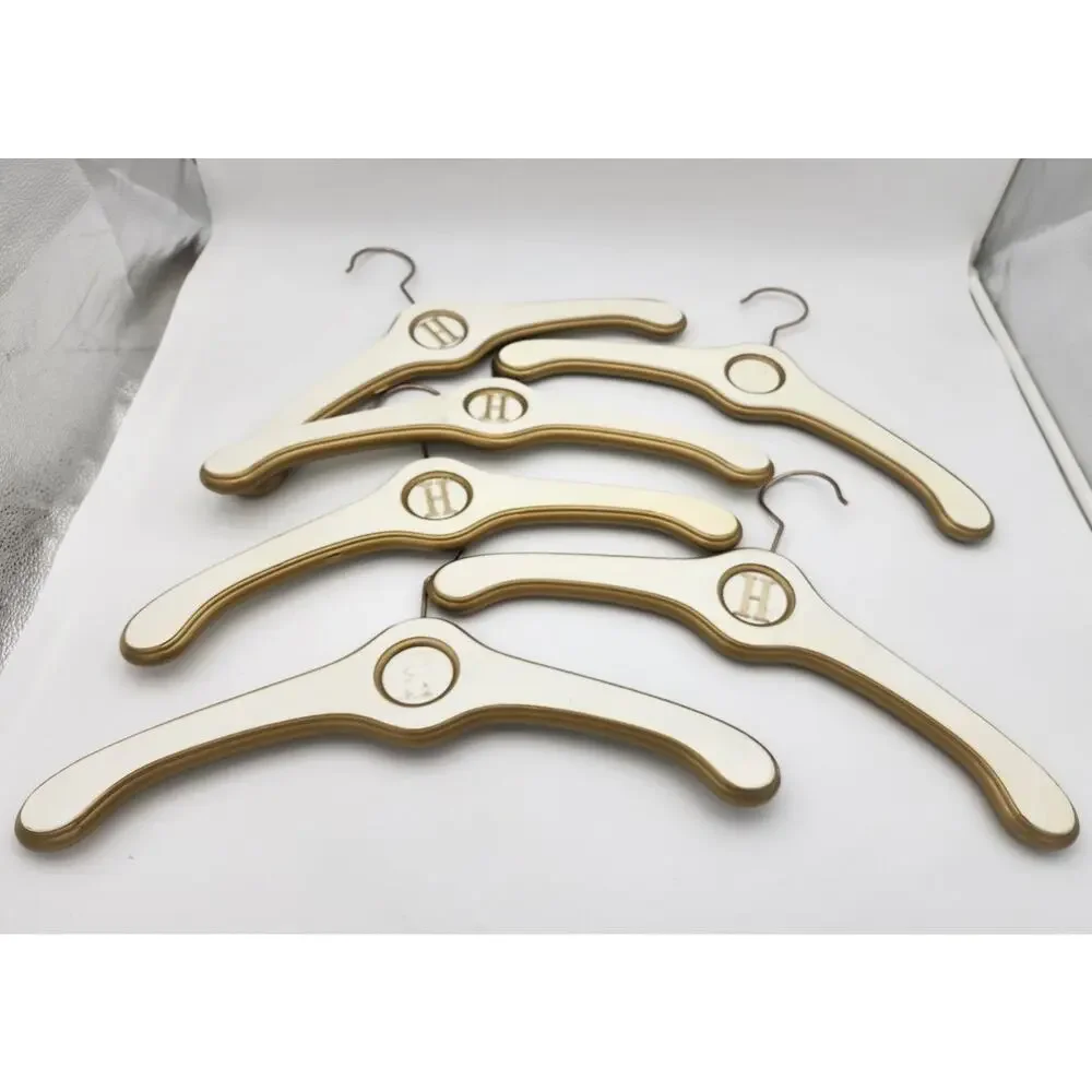 Vtg Lot of 6 Wood Coat Hangers White Gold Hollywood Regency Hotels 1950's